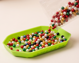 Pour pearl beads into a sorting tray